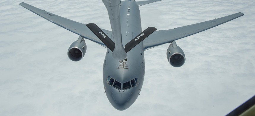 A KC-135 refuels a KC-46 over the Atlantic Ocean.