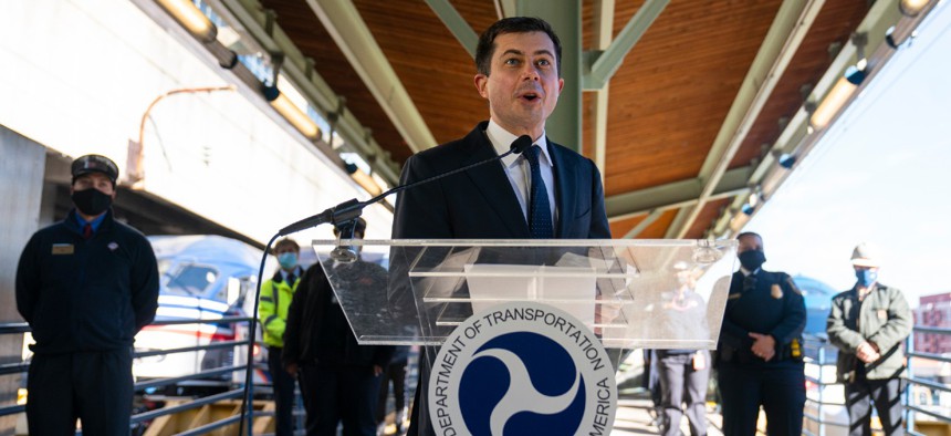 Transportation Secretary Pete Buttigieg speaks at Union Station on Feb. 5. Buttigieg is in quarantine after coming in close contact with a security detail member who tested positive for coronavirus.