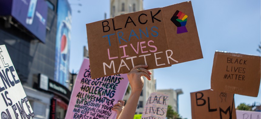 A protester holds a Black Trans Lives Matter sign at the All Black Lives Matter march in Hollywood in June.