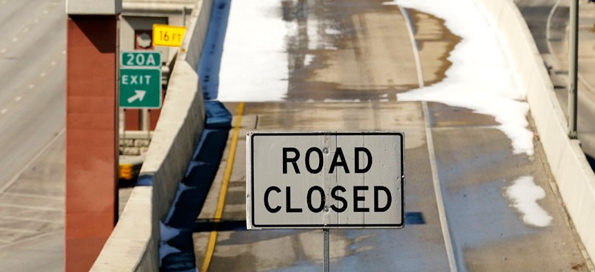 A sign blocks an on ramp to Interstate 410 on Friday in San Antonio, Texas. Many roads, highways and interstates remain closed due to icy conditions.