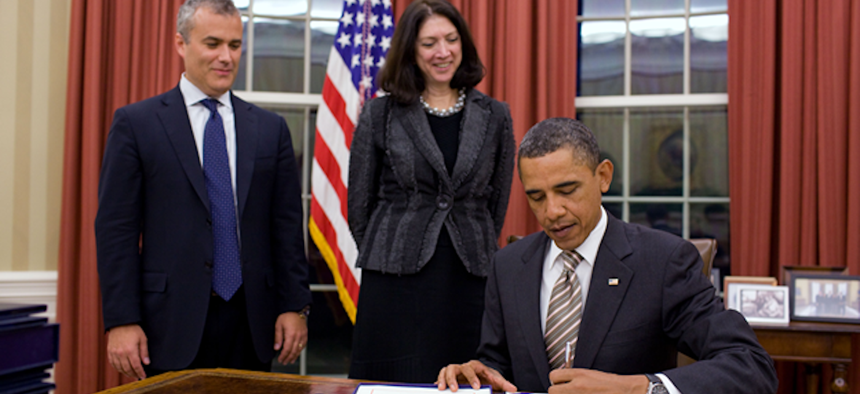 President Barack Obama signs the GPRA Modernization bill in 2011. With him is Chief Performance Officer/OMB Deputy Director for Management Jeff Zients and OMB Associate Director for Performance and Personnel Management, Shelley Metzenbaum.