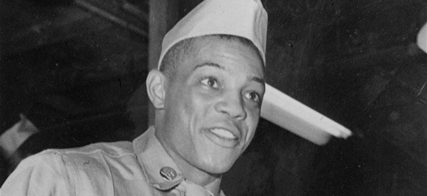 Pvt. Willie Mays, of the New York Giants' outfield, after being sent to Camp Kilmer, N.J. for processing following his induction into the U.S. Army on May 28, 1952.