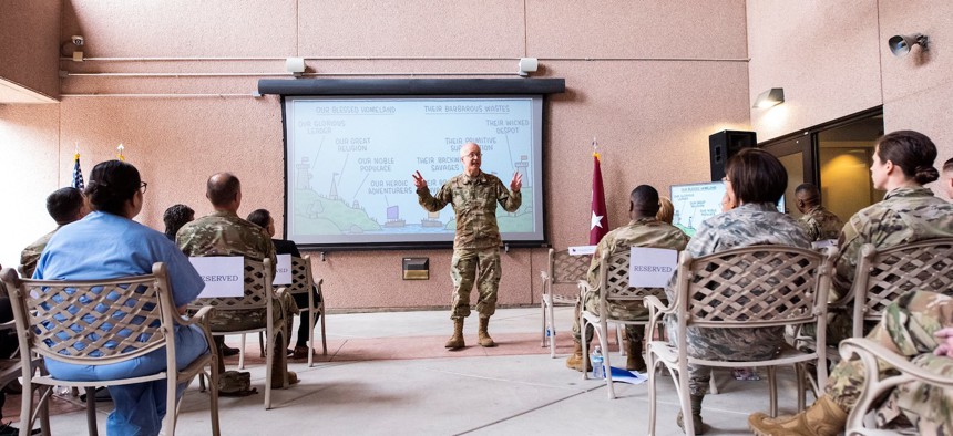 Army Lt. Gen. Ronald Place, Defense Health Agency Director, addresses members of the 99th Medical Group at Nellis Air Force Base, Nevada in February 2020.