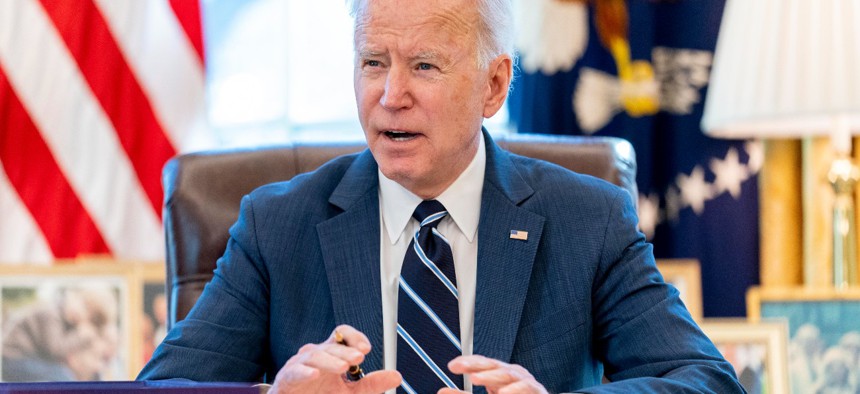 President Joe Biden speaks before signing the American Rescue Plan, a coronavirus relief package, in the Oval Office of the White House on March 11.