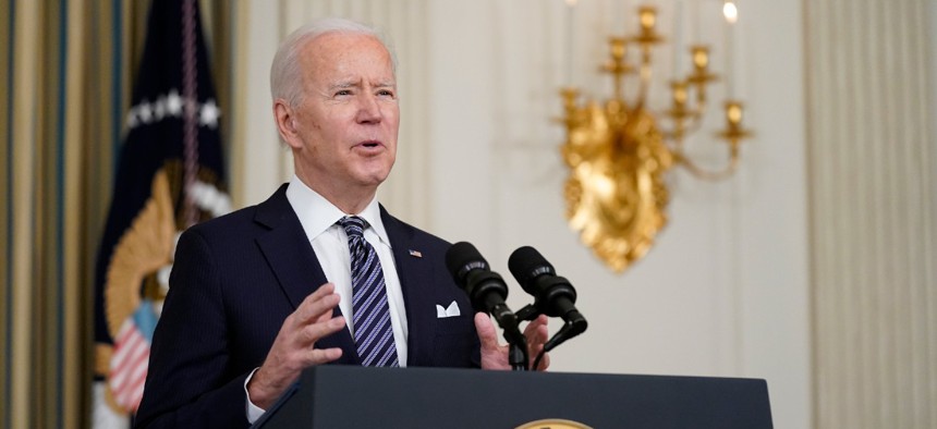 President Biden speaks about the COVID-19 relief package in the State Dining Room of the White House on March 15. 