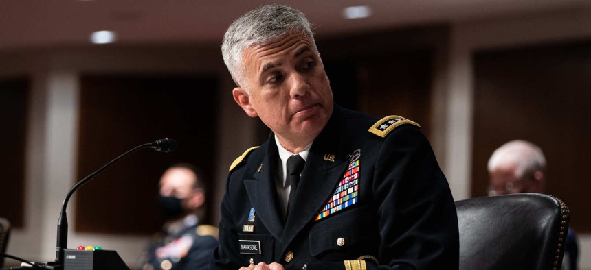  Gen. Paul M. Nakasone, Director of the National Security Agency listens during a Senate Armed Services Committee hearing March 25, 2021 on Capitol Hill in Washington DC.
