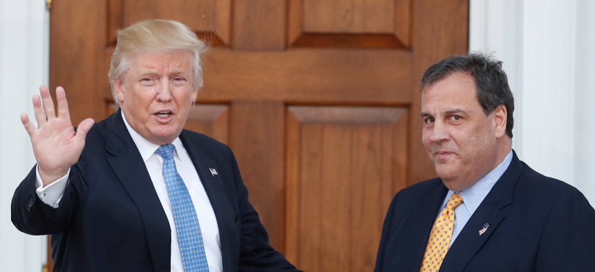 Then President-elect Donald Trump and Former New Jersey Gov. Chris Christie, Trump's transition manager at the time, speak to reporters on Nov. 20, 2016. Christie promised to root out any Obama appointees who had converted to civil service positions. 