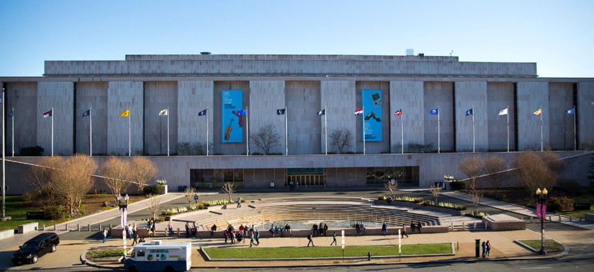 People visit the Smithsonian Museum of American History on the National Mall in Washington in April 2019. 