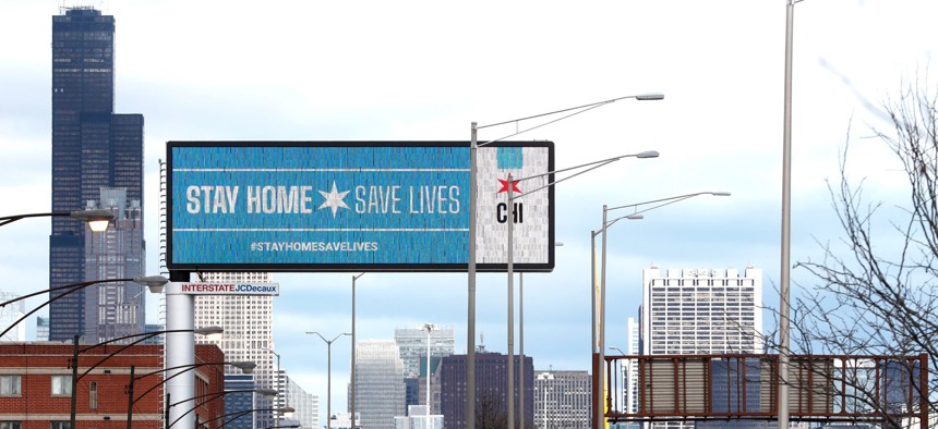 A public service message is seen on a billboard near the Dan Ryan Expressway in March 2020.