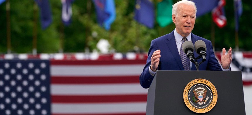 President Biden speaks during a rally Thursday in Duluth, Ga. to mark his 100th day in office.