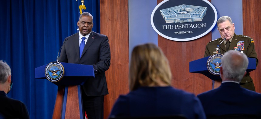 Defense Secretary Lloyd Austin and Chairman of the Joint Chiefs of Staff Army Gen. Mark Milley speak to press during a briefing at the Pentagon, May 6, 2021.