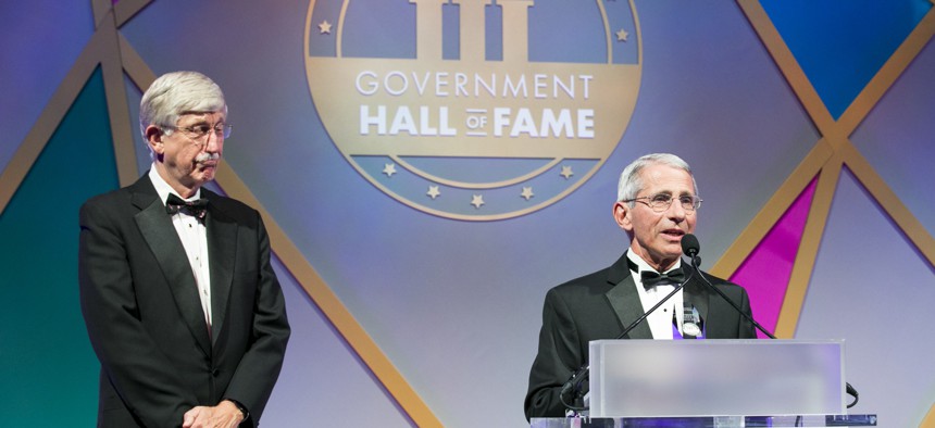 Dr. Anthony Fauci accepts his induction into the Government Hall of Fame in 2019 alongside NIH director Francis Collins.
