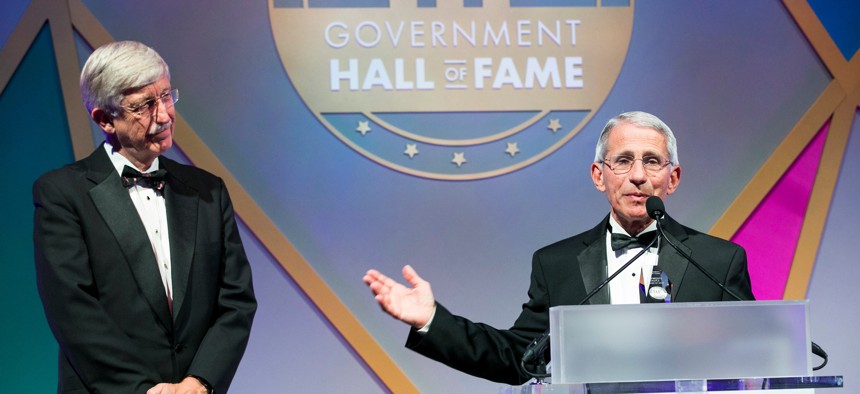Dr. Anthony Fauci accepts his induction into the Government Hall of Fame in 2019 alongside NIH director Francis Collins.