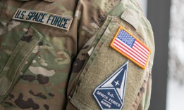 Staff Sgt. David Diehl II, 436th Communications Squadron noncommissioned officer in charge of wing cybersecurity, displays his new United States Space Force tapes and service branch patch at Dover Air Force Base, Delaware, Feb. 12, 2021.