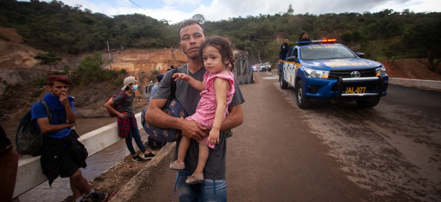 Migrants hoping to reach the distant U.S. border walk along a highway in Guatemala in January 2021.