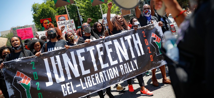 A Juneteenth rally at the Brooklyn Museum, Friday, June 19, 2020, in the Brooklyn borough of New York.