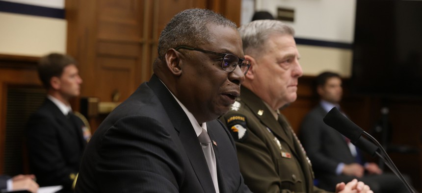 U.S. Secretary of Defense Lloyd Austin (L) and Chairman of the Joint Chiefs of Staff General Mark Milley (R) testify during a hearing before the House Committee on Armed Services on June 23, 2021, in Washington, D.C.