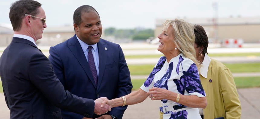 First Lady Jill Biden is greeted by Dallas County Judge Clay Jenkins, left, Dallas Mayor Eric Johnson and U.S. Rep. Eddie Bernice Johnson, D-Dallas, as she arrives at Love Field Airport in Dallas on June 29.