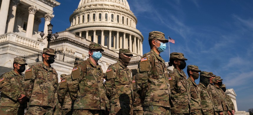 Members of the National Guard from California on the steps of the House, on Capitol Hill on March 11, 2021.