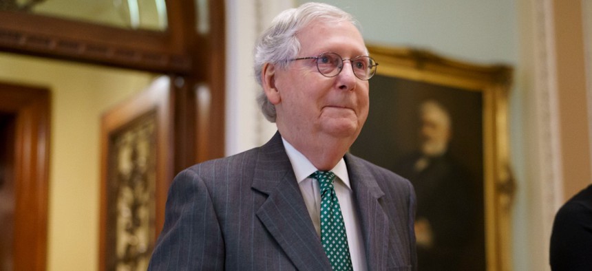 Senate Minority Leader Mitch McConnell, R-Ky., said Republicans will not follow Democrats' plan to link a debt ceiling increase to a stopgap spending measure keeping government open after Sept. 30. 