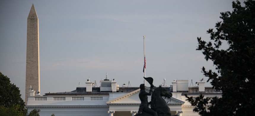 The U.S. flag flies at half mast over the White House after President Joe Biden delivered remarks on the terror attack at Hamid Karzai International Airport, and the U.S. troops and Afghan victims killed and wounded, August 26, 2021. 