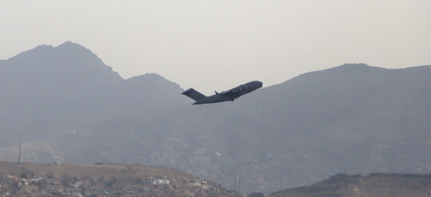 A U.S military aircraft takes off from the Hamid Karzai International Airport in Kabul, Afghanistan, Monday, Aug. 30, 2021. 