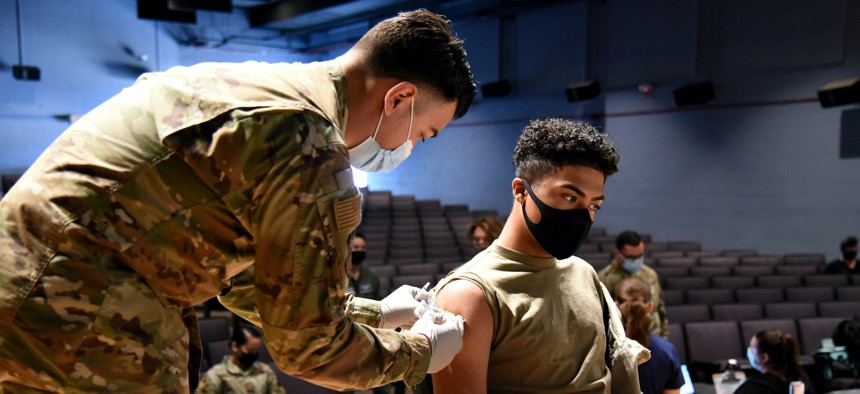 An airman receives the COVID-19 vaccine at Davis-Monthan Air Force Base, Tucson, Ariz., May 6, 2021.