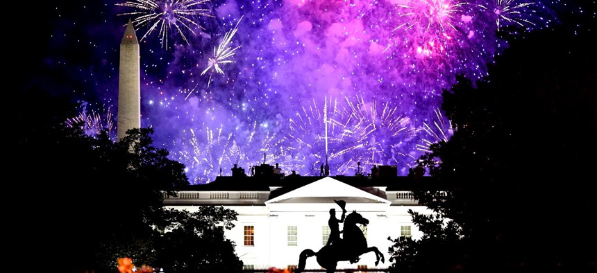 Fireworks light up the sky around the Washington Monument after President Trump delivered his acceptance speech at the White House to the 2020 Republican National Convention. The speech itself was not a Hatch Act violation, but other administration officials were found to have violated the law in the lead-up to the 2020 election. 