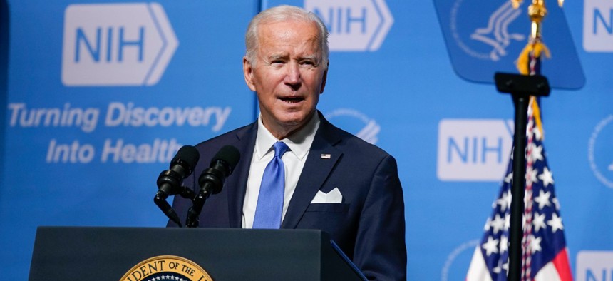 President Biden speaks about the COVID-19 variant named Omicron during a visit to the National Institutes of Health on Thursday. 