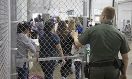 CBP agents conduct intake of illegal border crossers at the Central Processing Center in McAllen, Texas in 2018.