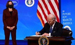 President Biden signs a "Made in America" executive order on Jan. 25, 2021, to increase the amount of federal spending that goes to American companies.