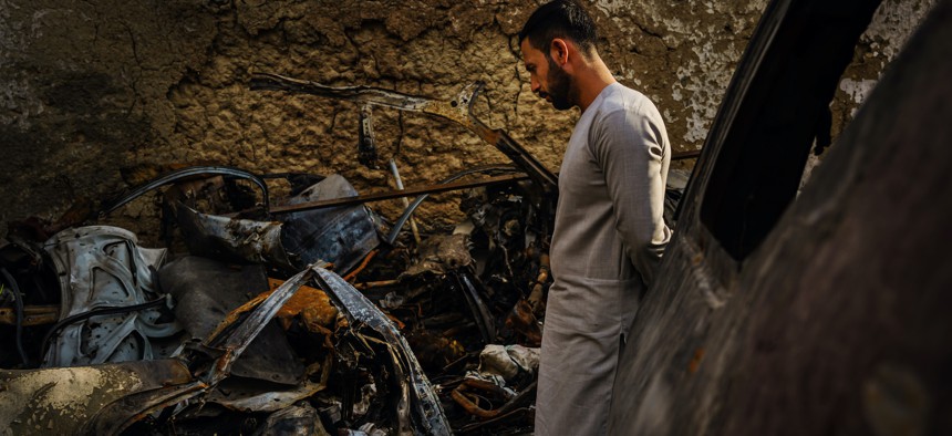 Emal Ahmadi surveys the damage to his family home in Kabul, Afghanistan, from a U.S. military drone strike that killed 10 of his family members, including his big brother, Zemari Ahmadi.