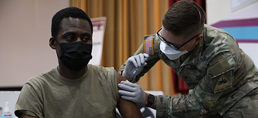 Soldier receives the COVID-19 vaccination at Stayton Theater, at Fort Bliss, Texas, Feb. 5, 2021.