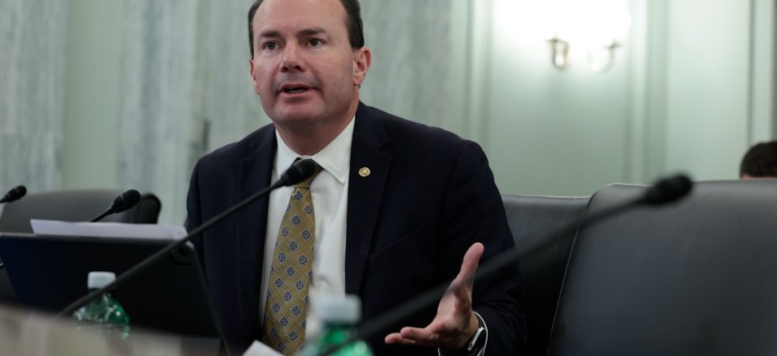 Sen. Mike Lee, R-Utah, is leading a small group of senators insisting on a vote on an amendment to block funding for Biden's vaccine mandates.