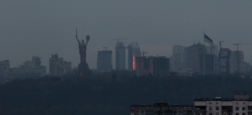 The Motherland Monument is pictured at dawn on the second day of the Russian invasion, Kyiv, capital of Ukraine.