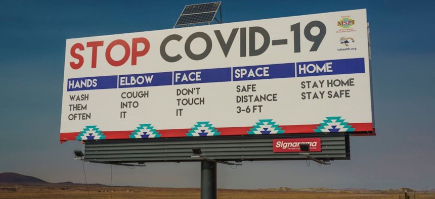 A COVID-19 warning billboard is shown in Arizona in 2020.