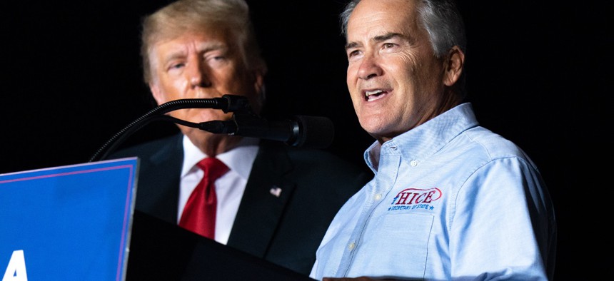 Rep. Jody Hice, R-Ga., speaks to the crowd during a rally as former President Donald Trump watches on September 25, 2021 in Perry, Georgia. Hice led a group of Republicans in introducing a bill to codify Trump workforce executive orders. 