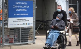 Residents arrive at a mass COVID-19 vaccination center set up in a parking lot outside of the United Center in Chicago in 2021.