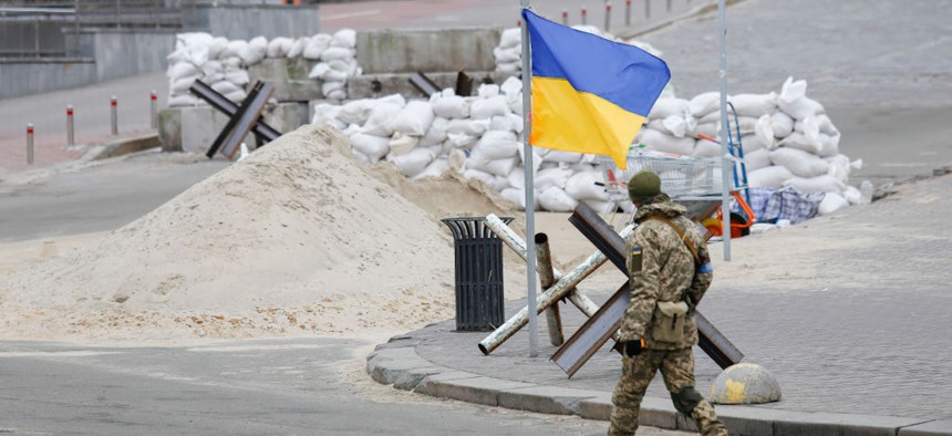 A solider walks in Kyiv on March 13.