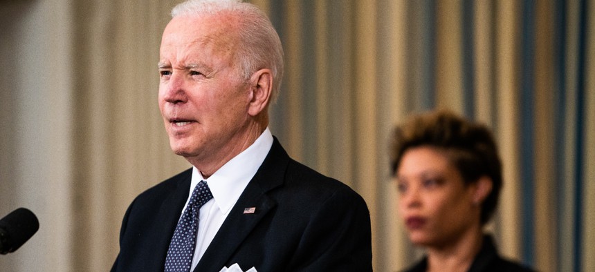 President Joe Biden delivers remarks about his budget proposal on March 28 as OMB chief Shalanda Young looks on.