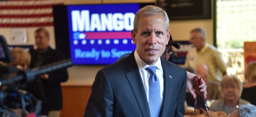 Paul Mango meets with supporters during his campaign for governor of Pennsylvania in 2018.