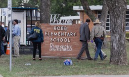 Law enforcement work the scene after a mass shooting at Robb Elementary School on Tuesday.