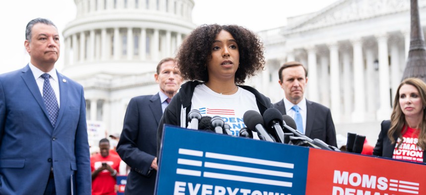 Ade Osadolor-Hernandez of Students Demand Action speaks at a rally outside the U.S. Capitol in May 2022.