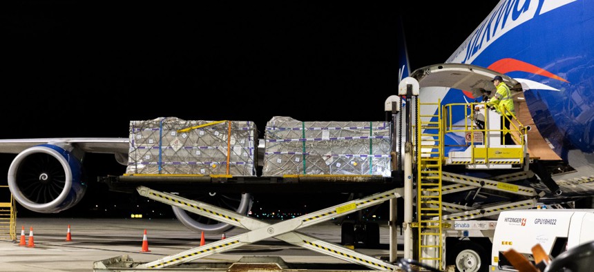 Bubs baby formula is loaded into a cargo plane at Melbourne Airport on June 12 for shipment to the United States to help with the shortage. 