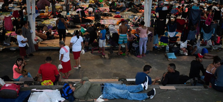 Migrants taking part in a caravan heading to the US, remain at a makeshift camp, in Huixtla, Chiapas state, Mexico, on June 8, 2022.