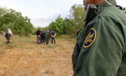 Border Patrol agents assisted by Air and Marine Operations and U.S. Fish and Wildlife Service apprehend migrants who were attempting to illegally enter the U.S. near Penitas, Texas in 2019.