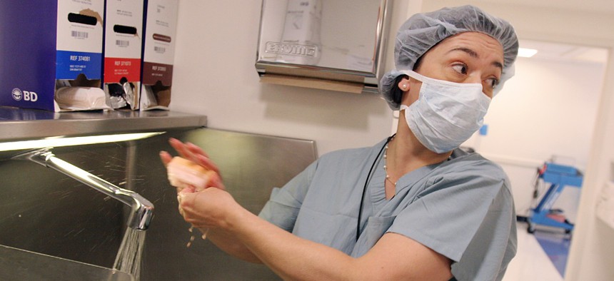 Dr. Monica Bertagnolli prepares for surgery at Brigham and Women's Hospital in June 2007. 