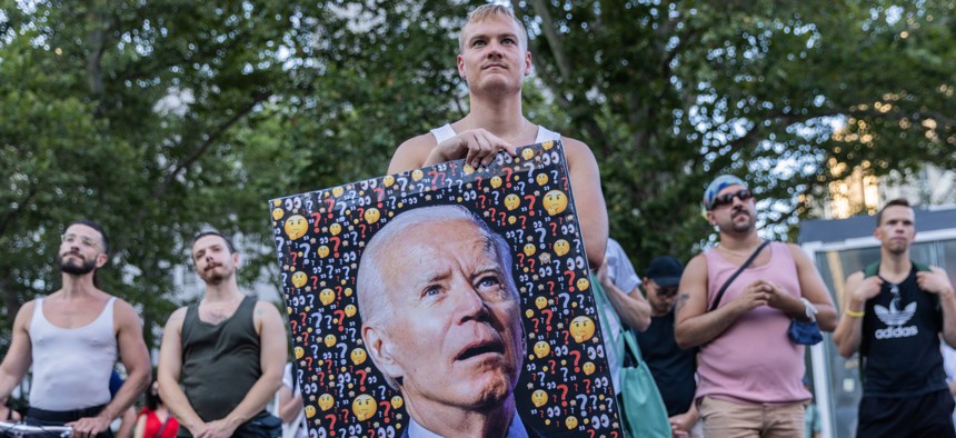 People protest during a rally calling for more government action to combat the spread of monkeypox in New York City, in July 2022. 