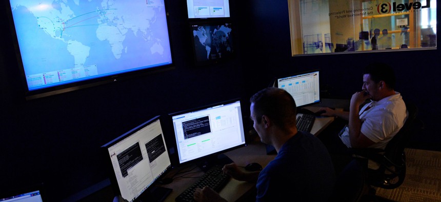 Cybersecurity workers at a private sector security operations center in Broomfield, Colo.