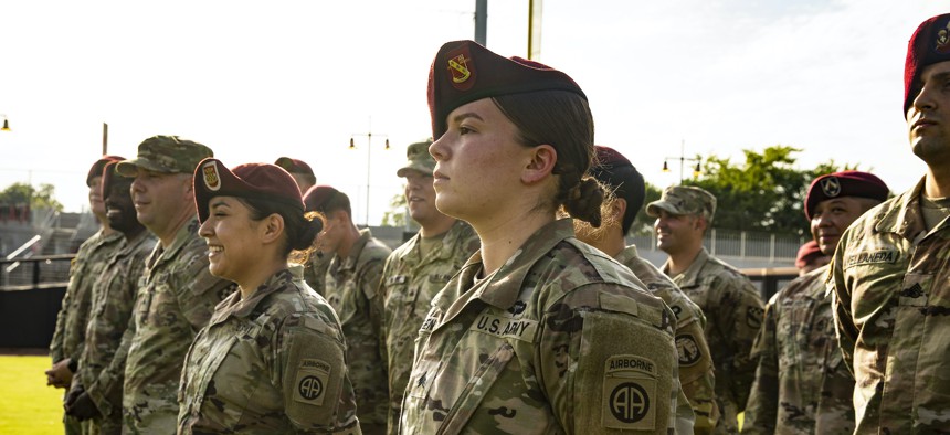 Soldiers from across the XVIII Airborne Corps stand in formation before an oath-of-enlistment ceremony at Segra Stadium in Fayetteville, N.C., on June 14, 2022. 